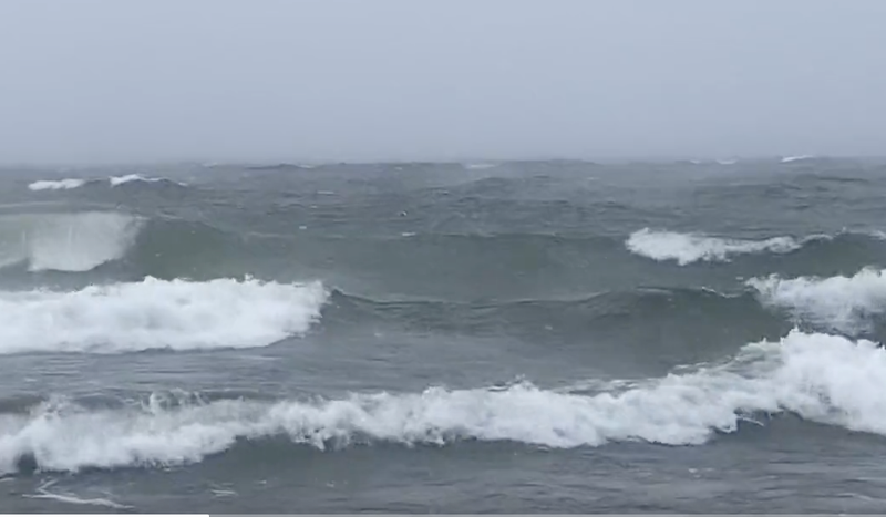 Photo of 20-foot waves breaking on Lake Michigan during winter storm