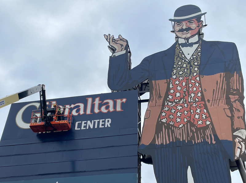 Sign being painted at Gibraltar Trade Center in Mount Clemens, Mich.