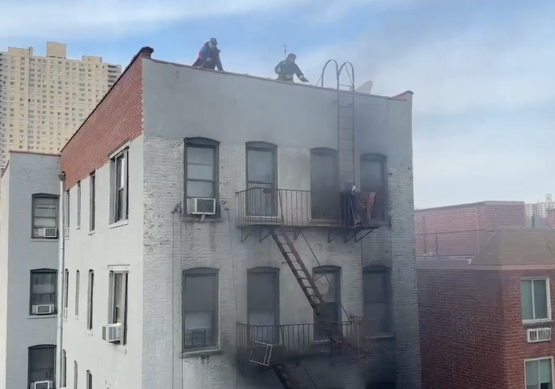 Fire personnel managing a fire in the Bronx Saturday.