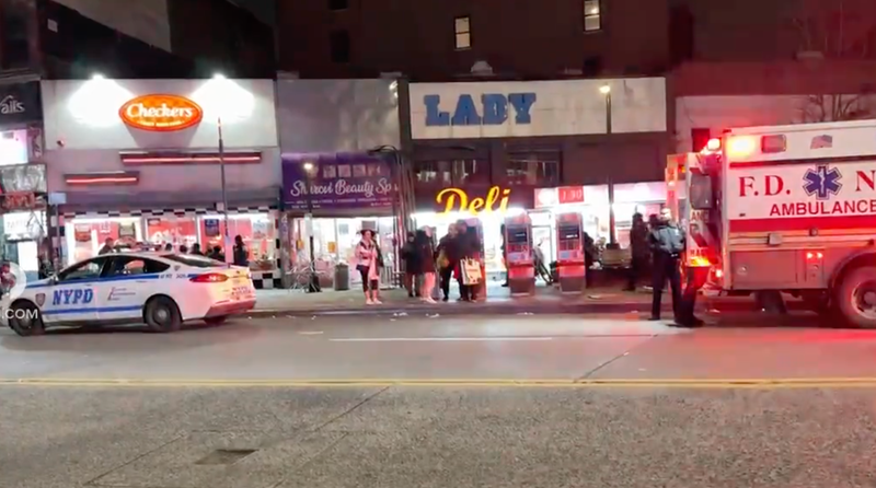 Police and emergency personnel responding to the stabbing of a 13-year-old and 16-year-old in the Bronx on Friday night.