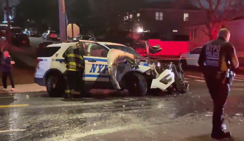 A police car crashed into a black SUV in Staten Island on Saturday in a multi-car collision that injured two officers and seven others.