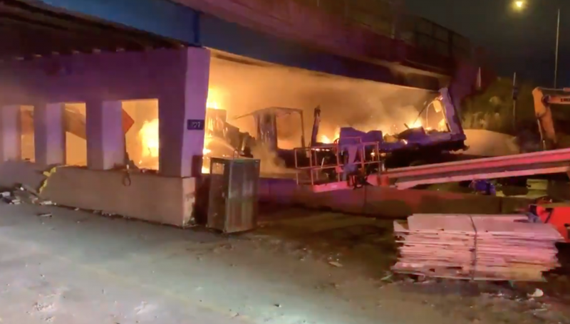 Firefighters extinguish a blaze Friday morning on the Tri-State Tollway at St. Charles Road.