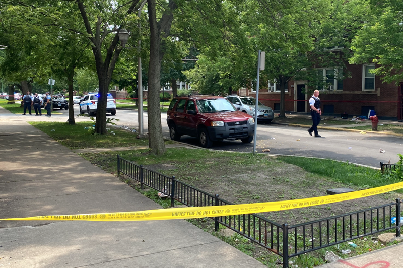 Police investigate at the site of a mass shooting Wednesday, July 14 in the 7800 block of South Bishop Street.