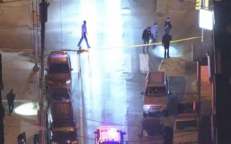 Police investigating the scene after cops in unmarked car were shot at, 1 injured by shattered glass during the incident in November.