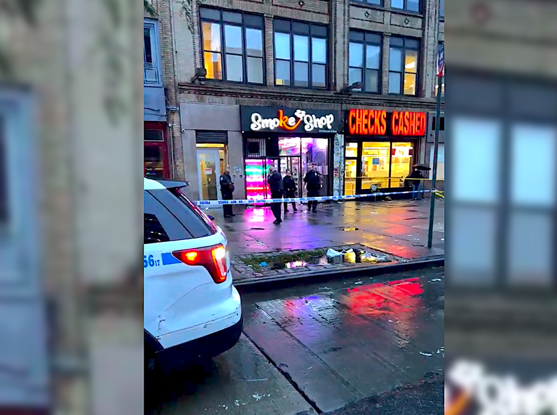 Investigators blocked off an area of sidewalk on Lenox Avenue following the shooting Tuesday morning