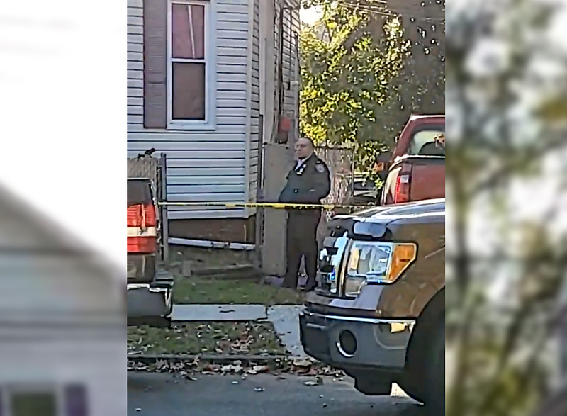 The woman's body was found in a large, plastic storage bin outside the home