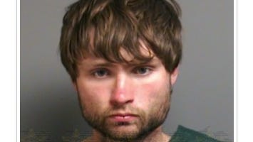 Machete-wielding man charged after attacking 2 teens, damaging car outside St. Clair County church