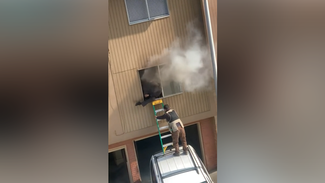 WATCH: Mystery hero pulls San Francisco man from window as apartment fire closes in