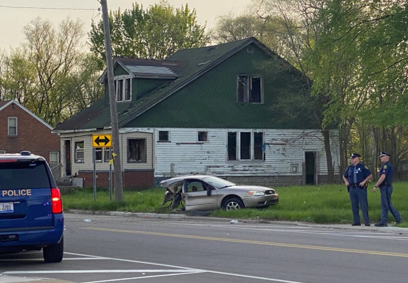 Half of car by state police SUV