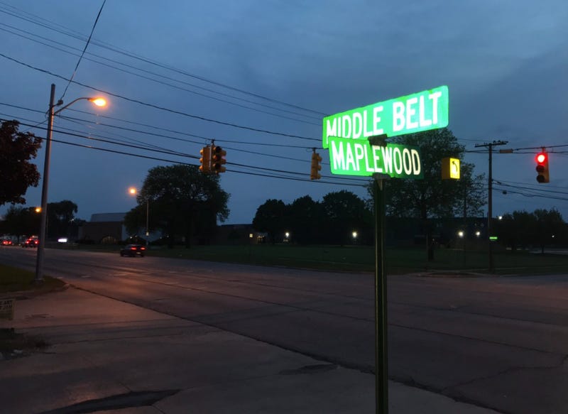 Road signs at intersection of Middlebelt and Maplewood