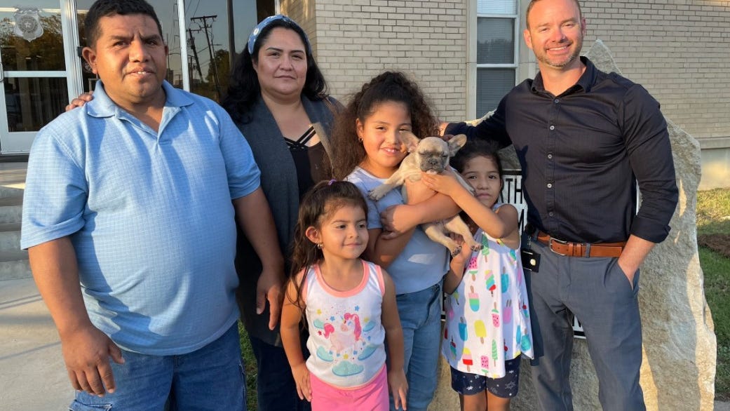 Fort Worth Police reunite stolen dog with owners