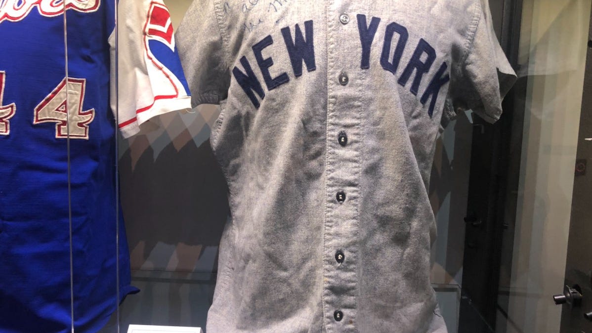 Auctions underway for autographed items from athletes like Mantle, Jordan, and Robinson