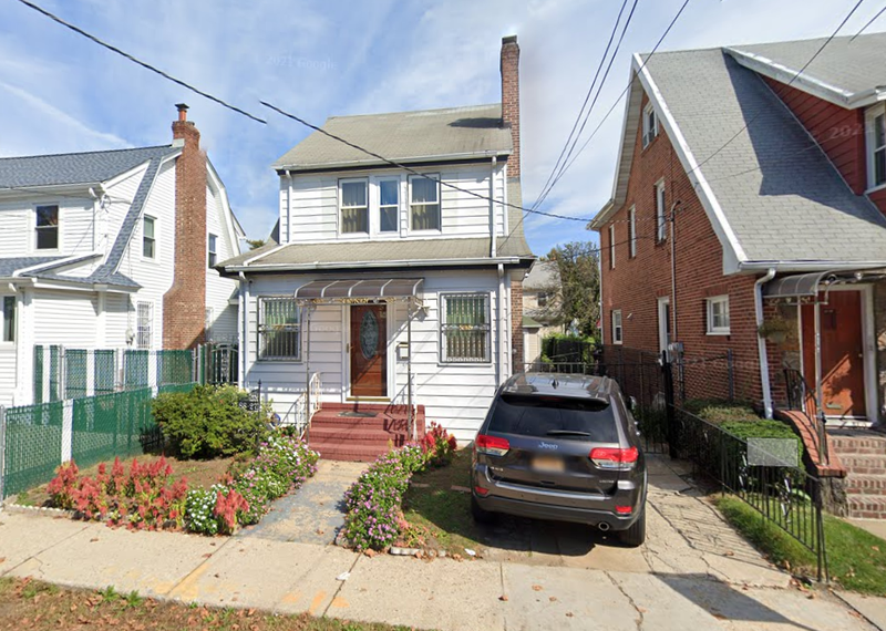 The house where a 29-year-old man was found stabbed to death with a machete on Sunday.