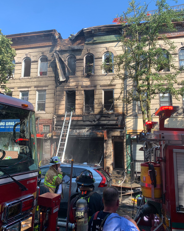 Firefighters respond to a three-alarm fire that injured 11.