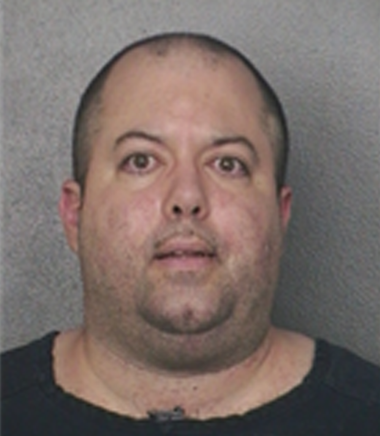 A 2014 mugshot of Garrett Santillo