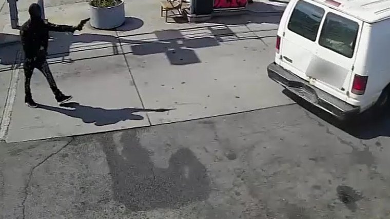 VIDEO: Masked gunman unloads on van at Bronx gas station