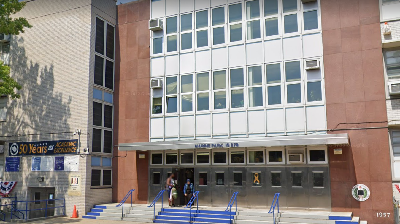 Woman shot in head at Brooklyn middle school next to infant, suspect being questioned