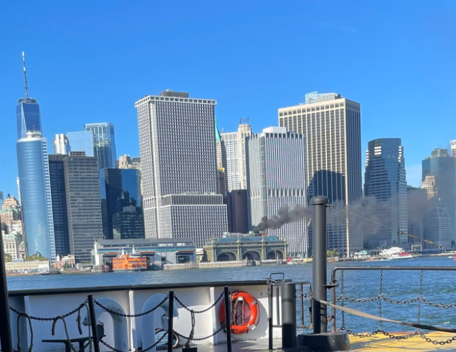 Smoke emanated from the roof of the Governors Island Ferry terminal after an air conditioning unit caught fire on Saturday.