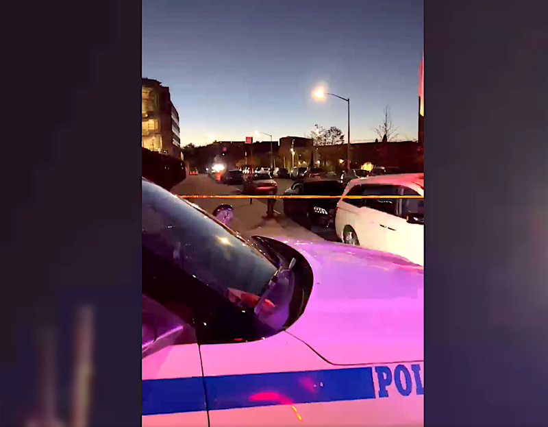 Police tape lined the area before dawn as an investigation into the shooting began