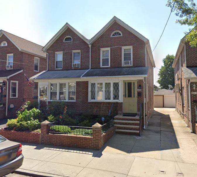 The Queens home where a woman was detained and robbed on Thursday.