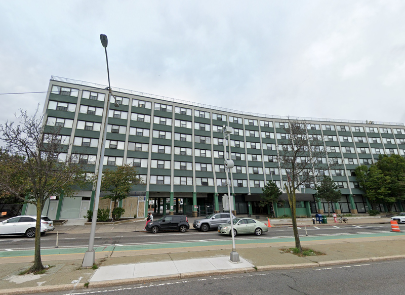 The boy was found unconscious at the shelter on Queens Boulevard that's the former site of the Pan Am Hotel