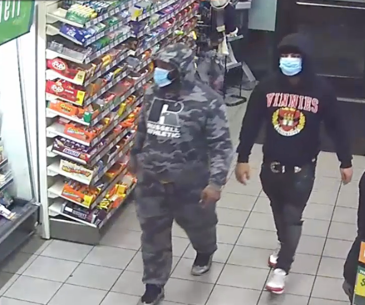 Police released images Wednesday of two men they're searching for in the Nov. 12 robbery