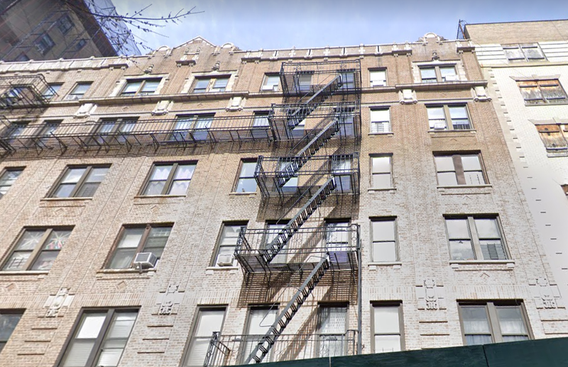 The West Harlem building where a fire injured nine people early Saturday morning.