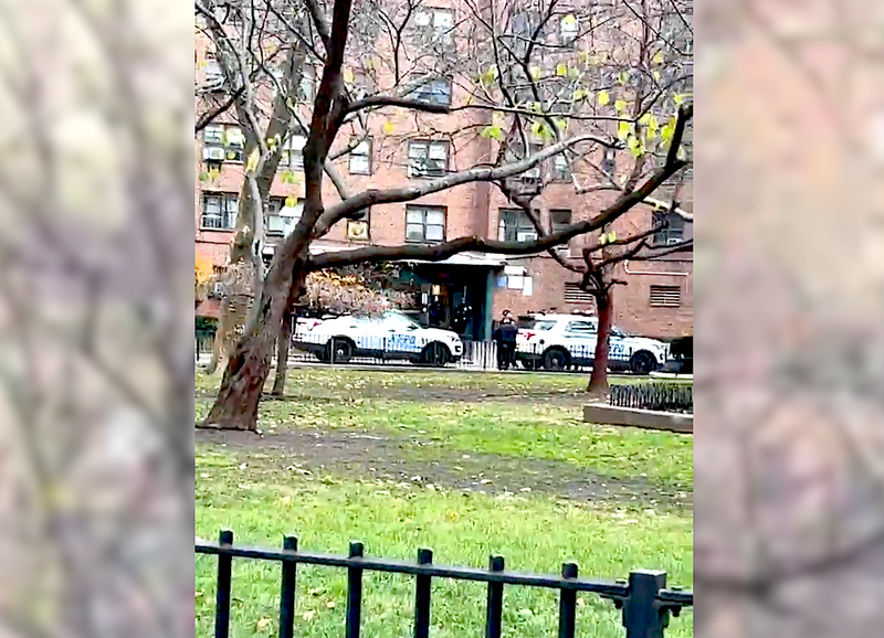 Police outside the Alfred E. Smith Houses in Lower Manhattan after a fatal shooting Monday afternoon