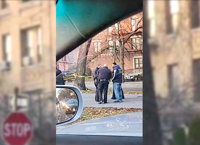 Police investigate at the scene after the shooting at Rochester Avenue and Eastern Parkway on Dec. 14, 2022