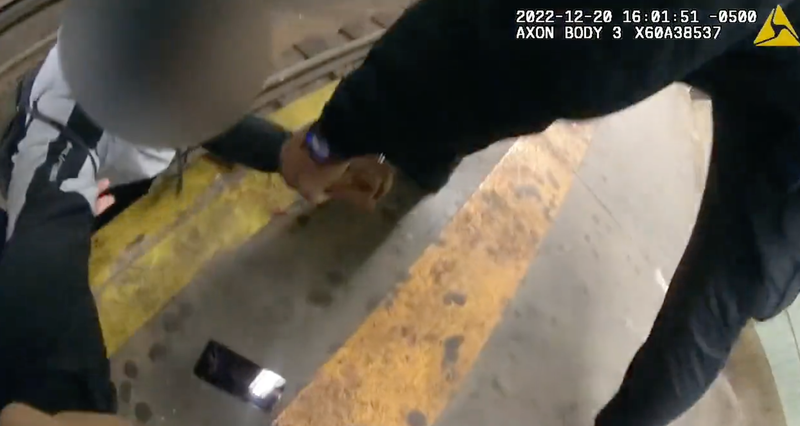 Video released shows the cops pulling the 50-year-old victim to safety.