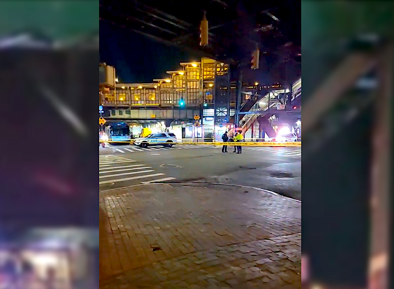 Police closed off the street after a man was critically injured in a hit-and-run crash at Roosevelt Avenue and 61st Street in Woodside