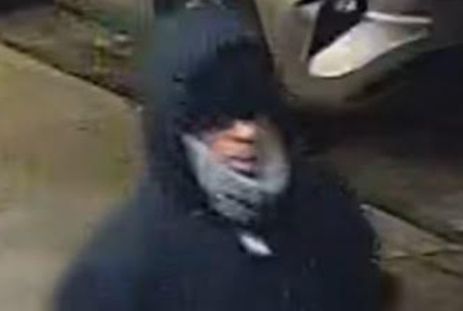 Police on Saturday released a photo of a man they're seeking for spray-painting anti-Hispanic comments in front of Brooklyn tattoo shop.