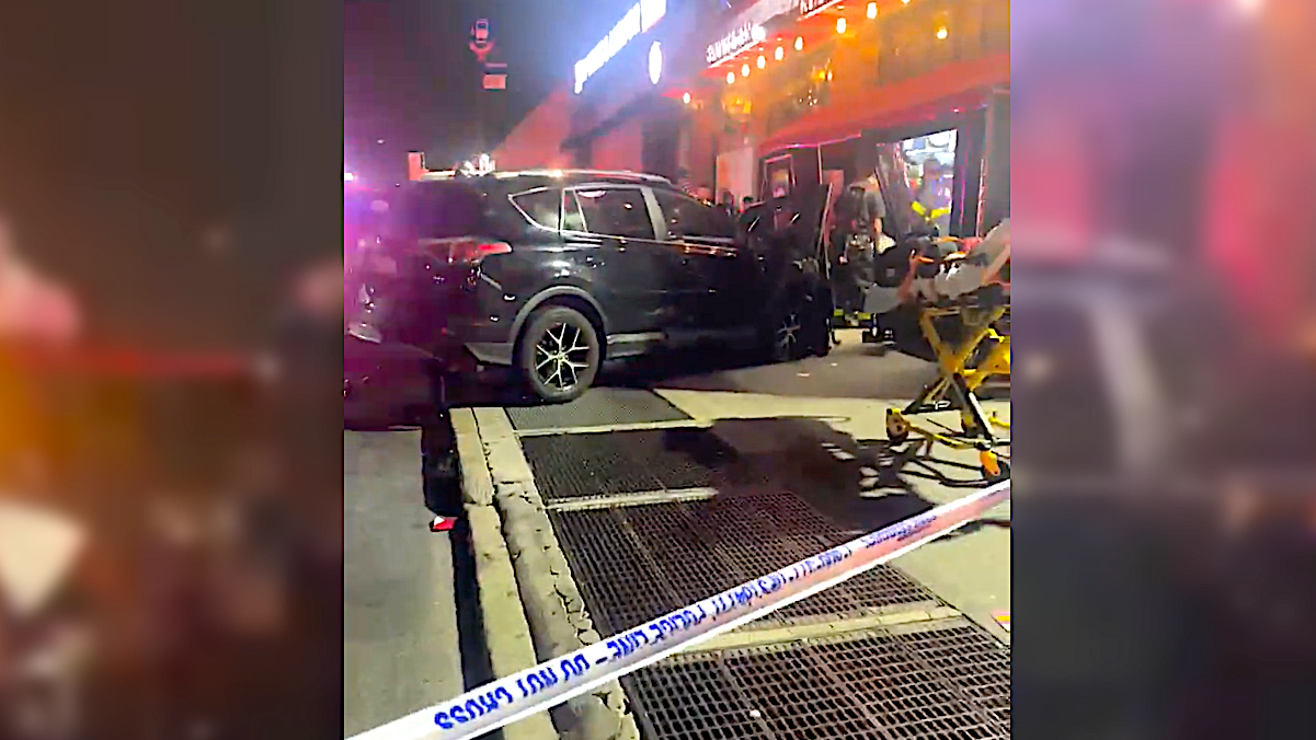 22 injured when SUV crashes into Manhattan sports bar after gas station dispute