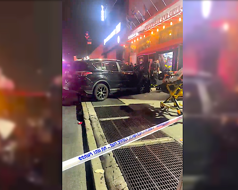 A chain-reaction crash caused a Toyota RAV4 driven by an Uber driver to barrel into the Inwood Bar & Grill on Broadway Monday night