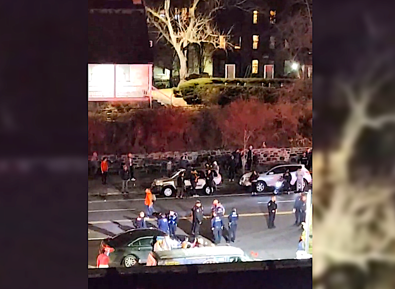 Police investigate at the scene following the crash around 9 p.m. Monday