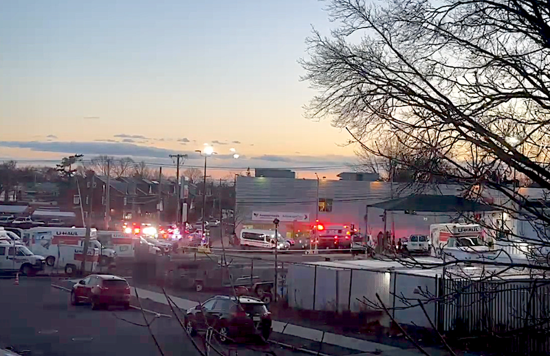 Police at the scene of the shooting on Wednesday evening