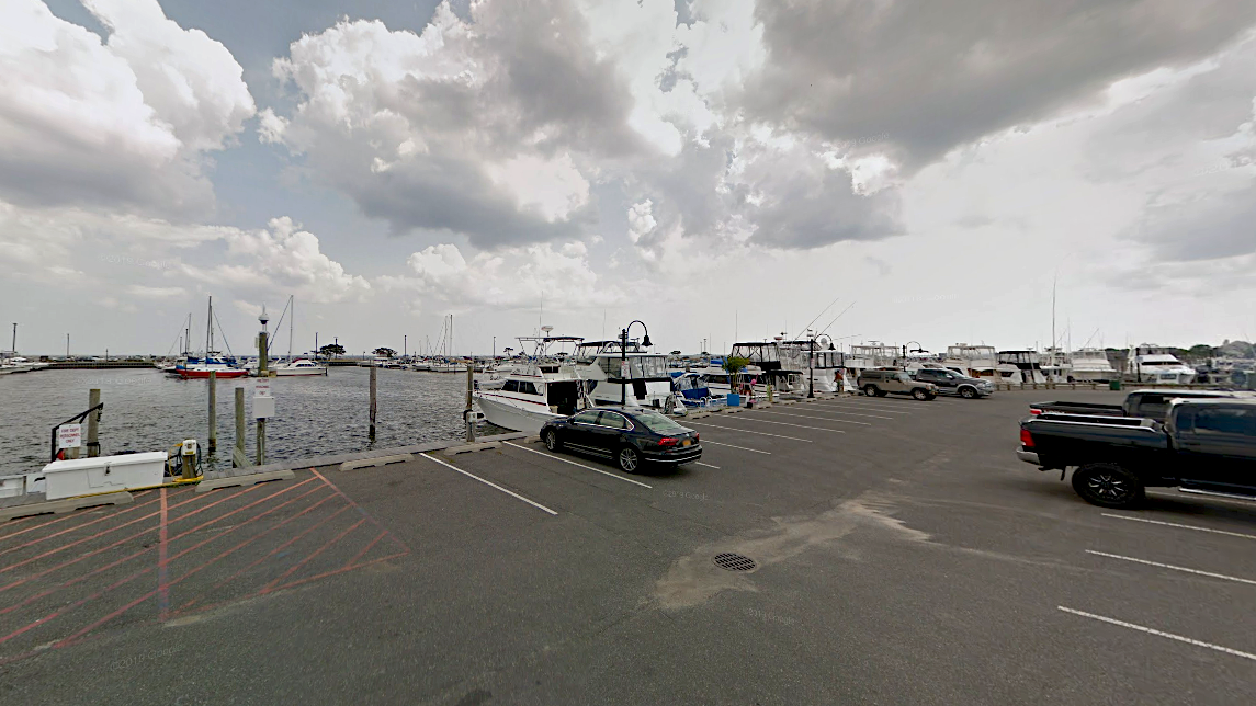 Man, 76, dies after car plunges into water at Suffolk marina: police