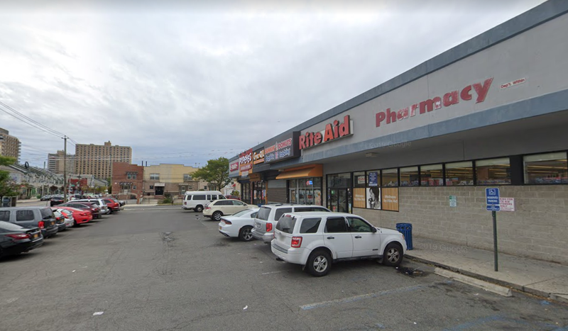 The parking lot in front of the small strip mall where a 17-year-old boy was fatally stabbed on Friday.