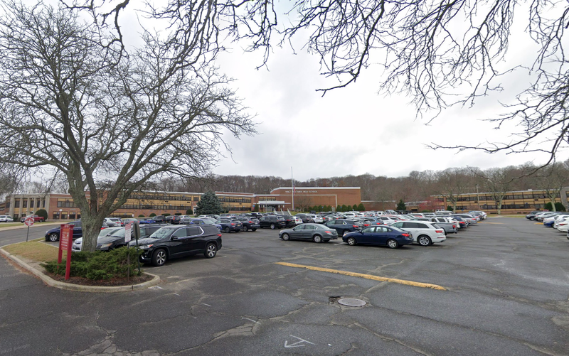 Armed security guards will be stationed outside Walt Whitman High School and other school buildings in South Huntington