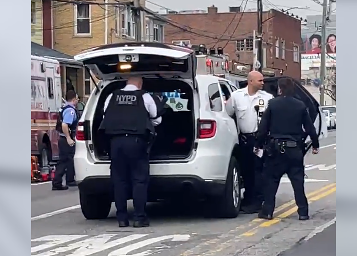 NYPD officers gathered outside the barricaded man's apartment Thursday morning.