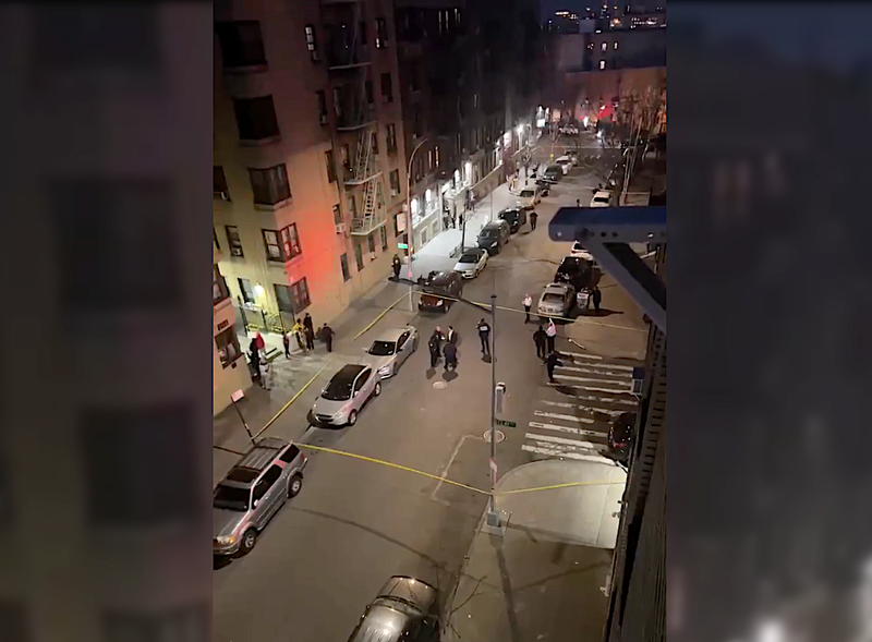 Police cordoned off a street in the Tremont section of the Bronx after a 21-year-old man was shot Wednesday evening