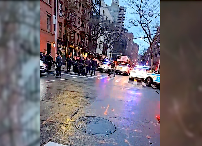 Police were seen taking a man into custody at W. 11th and Washington streets