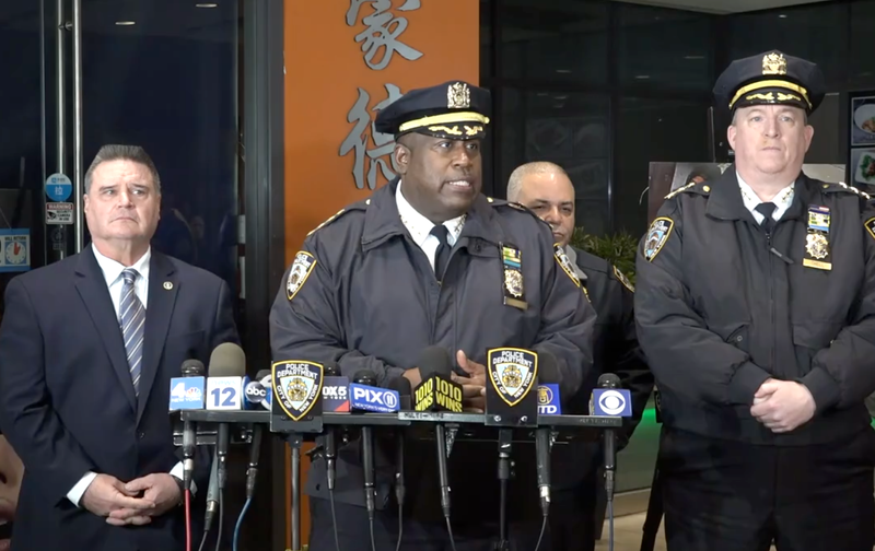 NYPD Chief of Department Jeffrey Maddrey (center) gives an update Tuesday on a jewelry store robbery in Flushing