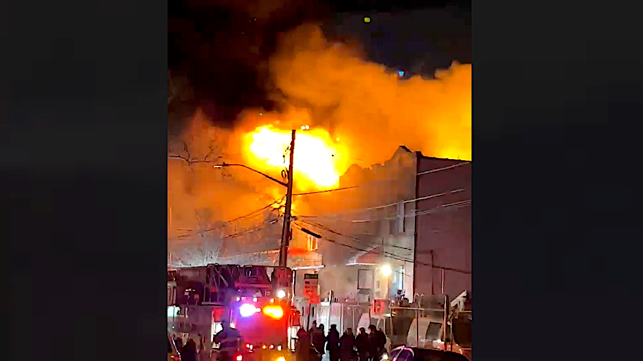 9 firefighters hurt as wind-fueled inferno engulfs Queens homes