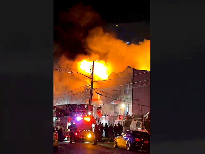 The fire spread through multiple attached homes on 59th Street, displacing more than a dozen families