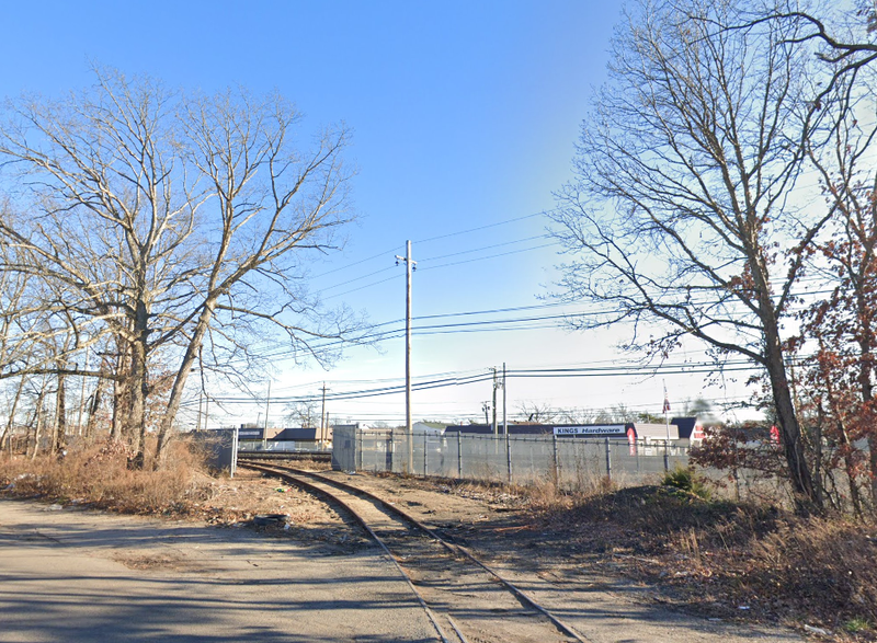 The carjacker fled jumped out of the car and fled onto LIRR tracks next to Merritt Avenue, police said