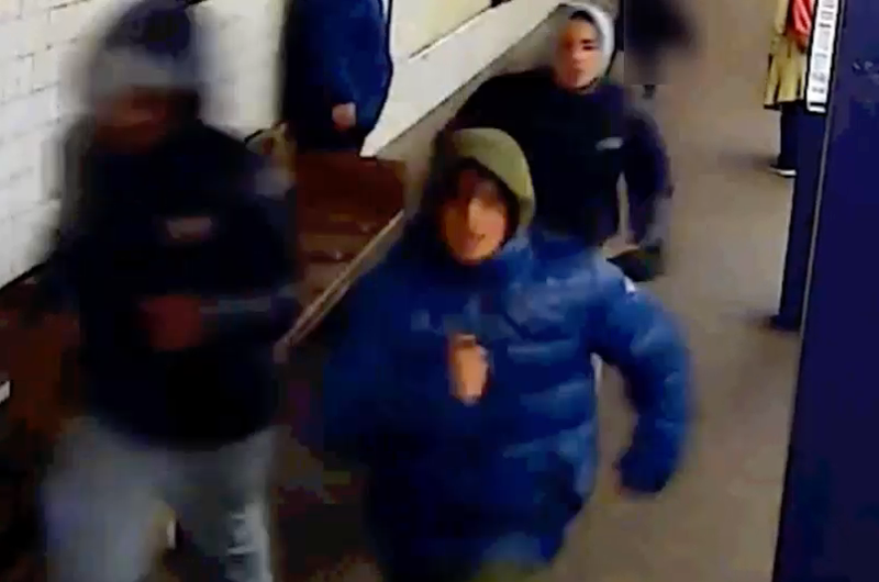 The suspects fled the station after stealing the victim's sneakers, police said