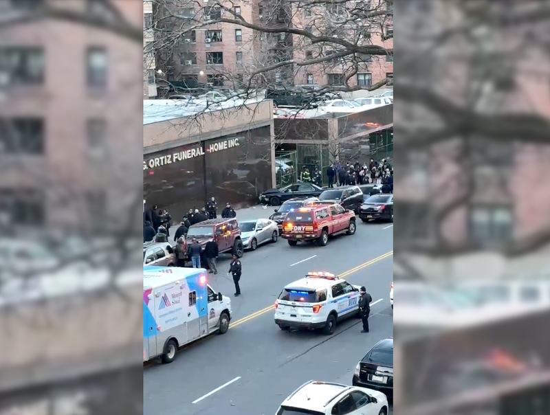 A driver jumped a curb, struck pedestrians and crashed into a funeral home in Washington Heights on Thursday morning