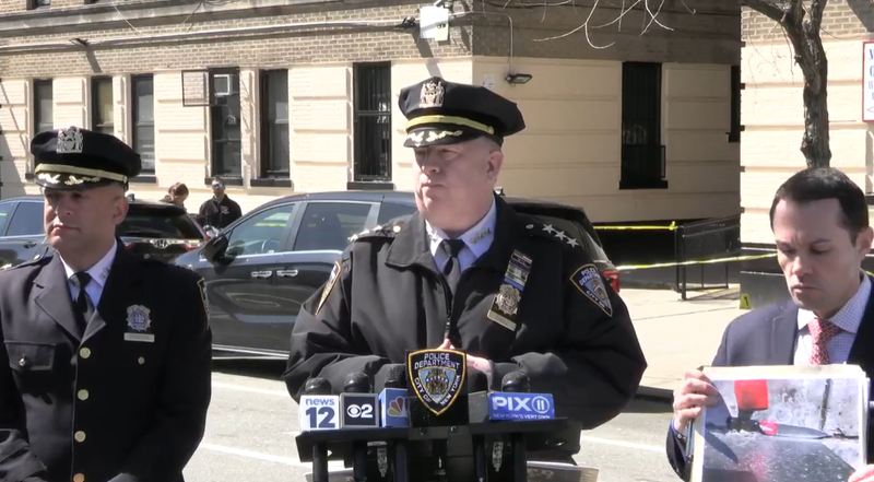 NYPD Chief John Chell (center) provides details on an incident in which officers shot a man experiencing a mental health crisis Sunday.