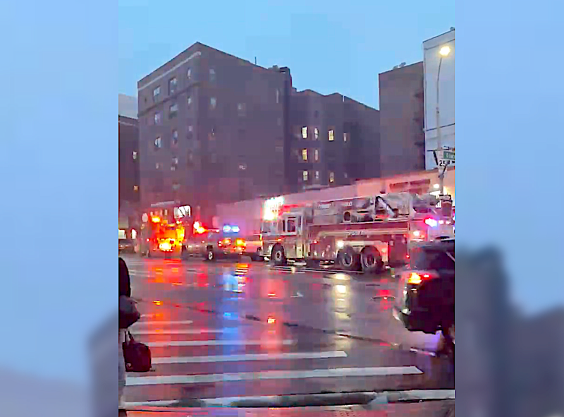 A 12-year-old fell between train cars on the R line in Elmhurst on Wednesday evening